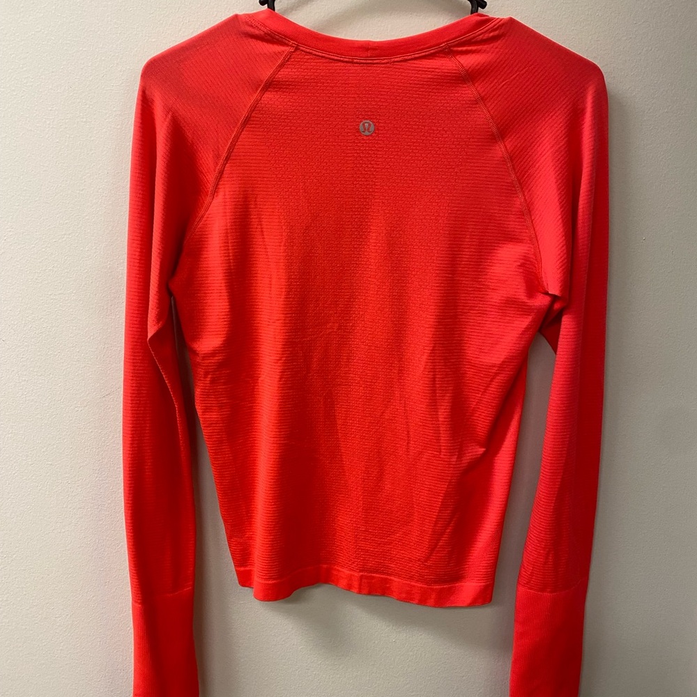 Swiftly Tech Long-Sleeve Shirt 2.0
Waist Length